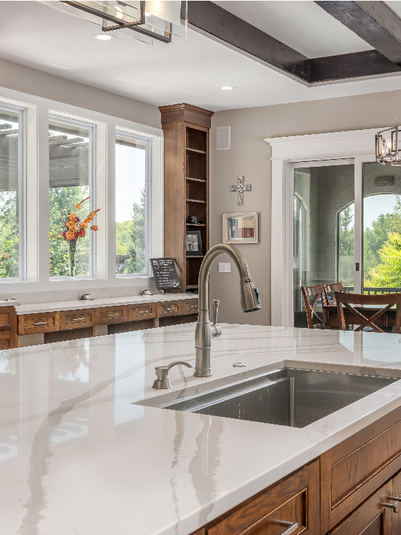 Kitchen Remodel by Mankin Construction – Kansas & Missouri Home Renovation Experts Remodeled kitchen with modern finishes by Mankin Construction – expert home remodeling and refinishing in Kansas and Missouri